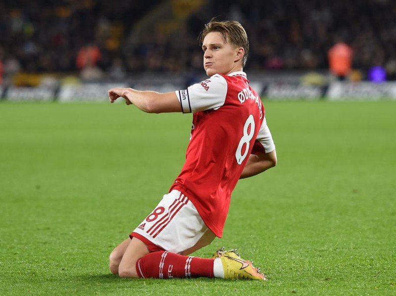 WOLVERHAMPTON, ENGLAND - NOVEMBER 12: Martin Odegaard of Arsenal celebrates after scoring his team's second goal during the Premier League match between Wolverhampton Wanderers and Arsenal FC at Molineux on November 12, 2022 in Wolverhampton, England. (Photo by Harriet Lander/Getty Images)