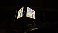Papan iklan semacam ini tersebar di beberapa titik kota Riyadh untuk menyambut kedatangan Ronaldo. (Foto: AFP via Getty Images/FAYEZ NURELDINE)