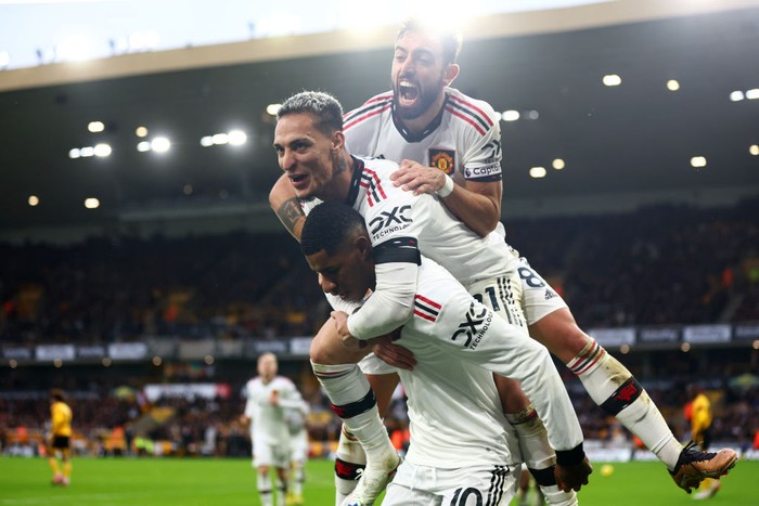 WOLVERHAMPTON, ENGLAND - DECEMBER 31: Marcus Rashford of Manchester United celebrates scoring a disallowed goal with Antony & Bruno Fernandes during the Premier League match between Wolverhampton Wanderers and Manchester United at Molineux on December 31, 2022 in Wolverhampton, United Kingdom. (Photo by Chris Brunskill/Fantasista/Getty Images)