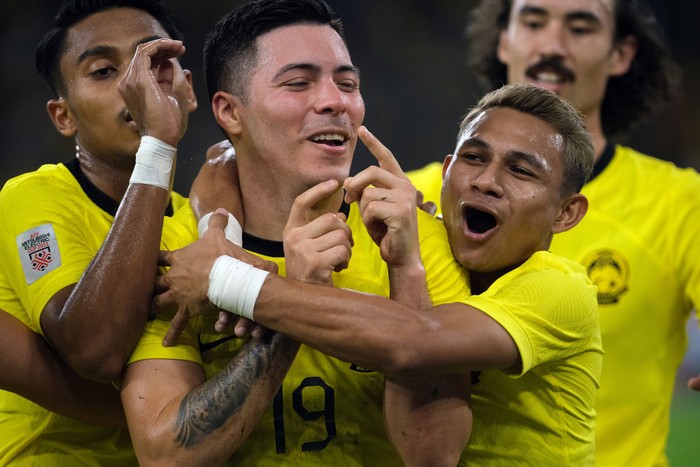 KUALA LUMPUR, MALAYSIA - DECEMBER 24: Sergio Aguero Ezequiel Aguero of Malaysia celebrates with his team mates after scoring during the AFF Mitsubishi Electric Cup Group B match Malaysia and Laos at Bukit Jalil National Stadium on December 24, 2022 in Kuala Lumpur, Malaysia. (Photo by How Foo Yeen/Getty Images)