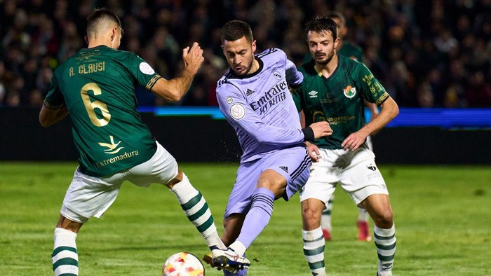 CACERES, SPAIN - JANUARY 03: Alvaro Clausi of CP Cacereno battle for the ball with Eden Hazard of Real Madrid CF during the Copa del Rey Round of 32 match between CP Cacereno and Real Madrid at Estadio Principe Felipe on January 03, 2023 in Caceres, Spain. (Photo by Diego Souto/Quality Sport Images/Getty Images)