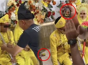 Viral Pengantin Wanita Menahan Malu, Suami Diberi Hadiah Kondom di Pelaminan Viral Pengantin Wanita Menahan Malu, Suami Diberi Hadiah Kondom di Pelaminan