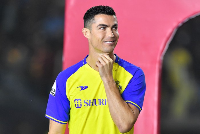 Al-Nassrs new Portuguese forward Cristiano Ronaldo greets the fans during his unveiling at the Mrsool Park Stadium in the Saudi capital Riyadh on January 3, 2023. (Photo by AFP) (Photo by -/AFP via Getty Images)