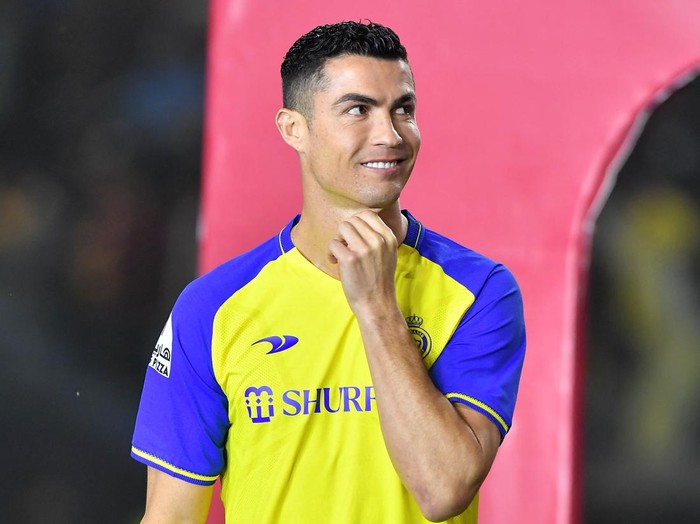 Al-Nassr's new Portuguese forward Cristiano Ronaldo greets the fans during his unveiling at the Mrsool Park Stadium in the Saudi capital Riyadh on January 3, 2023. (Photo by AFP) (Photo by -/AFP via Getty Images)