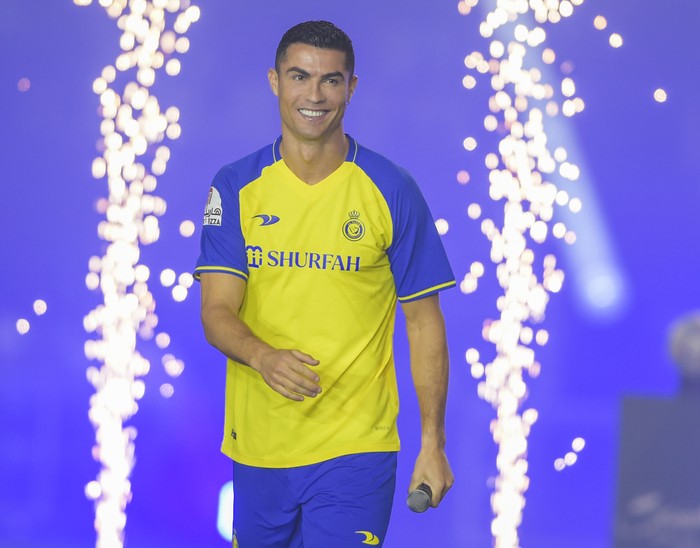 RIYADH, SAUDI ARABIA - JANUARY 03: Cristiano Ronaldo smiles as he is unveiled as an Al Nassr player at Mrsool Park Stadium on January 3, 2023 in Riyadh, Saudi Arabia. (Photo by Khalid Alhaj/MB Media/Getty Images)