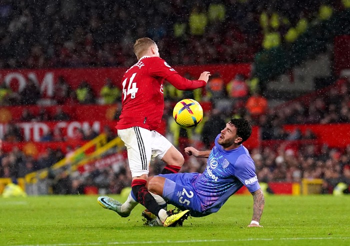EDITORS NOTE: GRAPHIC Manchester Uniteds Donny van de Beek (left) suffers an injury whilst battling for the ball against Bournemouths Marcos Senesi during the Premier League match at Old Trafford, Manchester. Picture date: Tuesday January 3, 2023. (Photo by Tim Goode/PA Images via Getty Images)