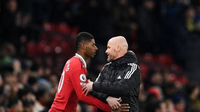 MANCHESTER, ENGLAND - JANUARY 03: Marcus Rashford of Manchester United celebrates Luke Shaw scoring their second goal during the Premier League match between Manchester United and AFC Bournemouth at Old Trafford on January 03, 2023 in Manchester, England. (Photo by Matthew Peters/Manchester United via Getty Images)
