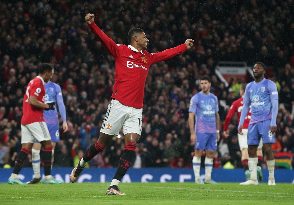 MANCHESTER, ENGLAND - JANUARY 03: Marcus Rashford of Manchester United celebrates Luke Shaw scoring their second goal during the Premier League match between Manchester United and AFC Bournemouth at Old Trafford on January 03, 2023 in Manchester, England. (Photo by Matthew Peters/Manchester United via Getty Images)
