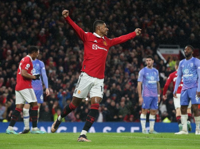 MANCHESTER, ENGLAND - JANUARY 03: Marcus Rashford of Manchester United celebrates Luke Shaw scoring their second goal during the Premier League match between Manchester United and AFC Bournemouth at Old Trafford on January 03, 2023 in Manchester, England. (Photo by Matthew Peters/Manchester United via Getty Images)