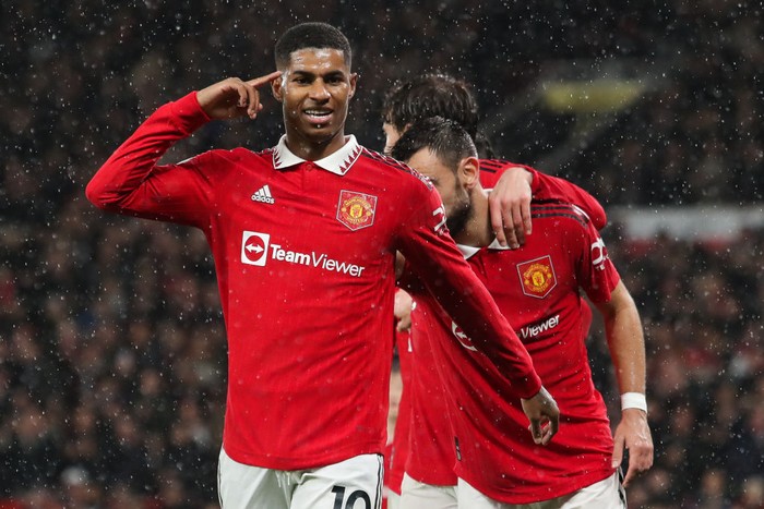 Marcus Rashford MANCHESTER, ENGLAND - JANUARY 03: Marcus Rashford of Manchester United celebrates after scoring his side's third goal during the Premier League match between Manchester United and AFC Bournemouth at Old Trafford on January 03, 2023 in Manchester, England. (Photo by James Gill - Danehouse/Getty Images)