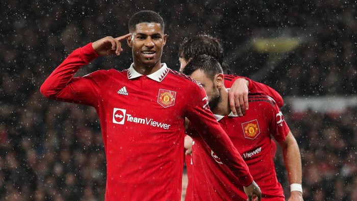 MANCHESTER, ENGLAND - JANUARY 03: Marcus Rashford of Manchester United celebrates after scoring his sides third goal during the Premier League match between Manchester United and AFC Bournemouth at Old Trafford on January 03, 2023 in Manchester, England. (Photo by James Gill - Danehouse/Getty Images)