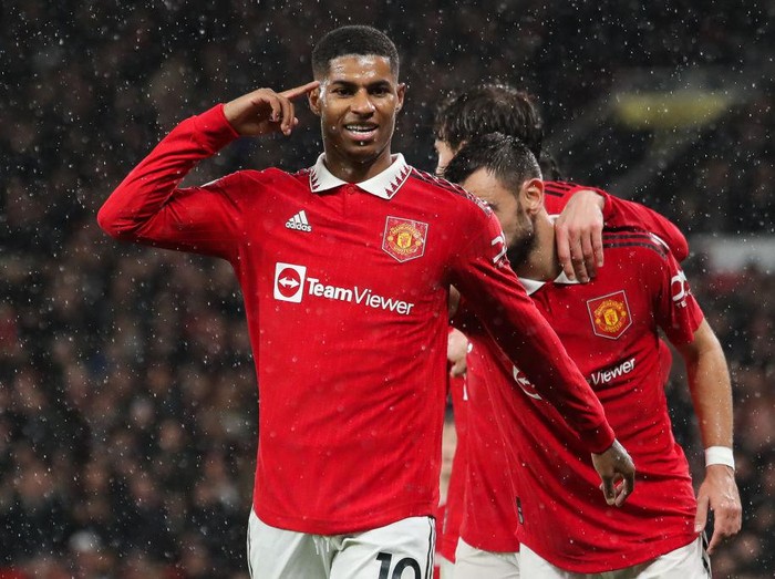MANCHESTER, ENGLAND - JANUARY 03: Marcus Rashford of Manchester United celebrates after scoring his side's third goal during the Premier League match between Manchester United and AFC Bournemouth at Old Trafford on January 03, 2023 in Manchester, England. (Photo by James Gill - Danehouse/Getty Images)