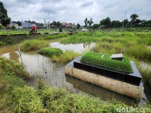 Penampakan TPU Tanah Kusir Tergenang Akibat Hujan Lebat