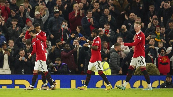 Manchester Uniteds Marcus Rashford celebrates after scoring a penalty, the third goal of his team during the English FA Cup soccer match between Manchester United and Everton at Old Trafford in Manchester, England, Friday, Jan. 6, 2023. (AP Photo/Dave Thompson)