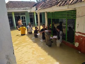 Potret Banjir Rendam Blega Bangkalan Potret Banjir Rendam Blega Bangkalan