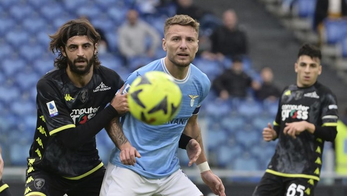 Lazios Ciro Immobile, centre, waits to receive the ball during the Italian soccer Serie A match between SS Lazio and Empoli, at the Olimpic Stadium in Rome, Italy, Sunday Jan. 8, 2023. (Alfredo Falcone/LaPresse via AP)