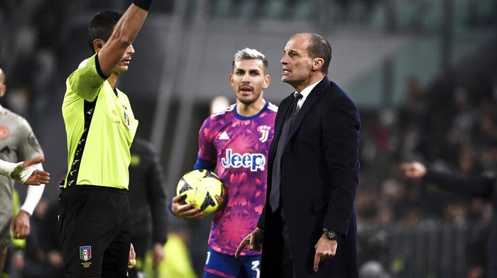 Juventus manager Massimiliano Allegri is shown a yellow card, during the Italian Serie A soccer match between Juventus and Udinese, at the Juventus stadium in Turin, Italy, Saturday Jan. 7, 2023 (Marco Alpozzi/LaPresse via AP)