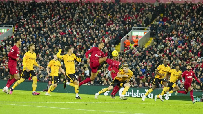 Liverpools Joel Matip, centre, controls the ball during the English FA Cup soccer match between Liverpool and Wolverhampton Wanderers at Anfield in Liverpool, England Saturday, Jan. 7, 2023 (AP Photo/Jon Super)
