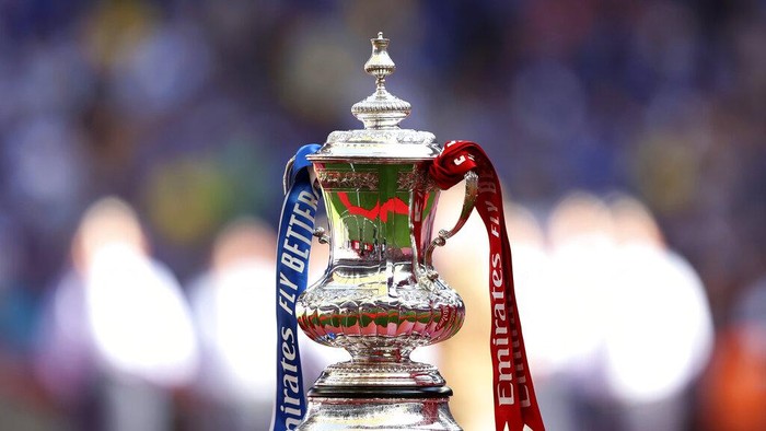 The trophy is displayed on the pitch before the start of the English FA Cup final soccer match between Chelsea and Liverpool, at Wembley stadium, in London, Saturday, May 14, 2022. (AP Photo/Ian Walton)