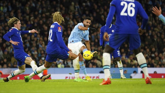 Manchester Citys Riyad Mahrez celebrates after scoring his sides opening goal during the English FA Cup soccer match between Manchester City and Chelsea at the Etihad Stadium in Manchester, England, Sunday, Jan. 8, 2023. (AP Photo/Dave Thompson)