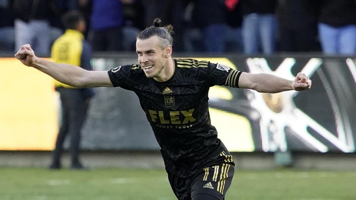 FILE -  Los Angeles FC forward Gareth Bale (11) celebrates after defeating the Philadelphia Union in penalties to win the MLS Cup soccer match Saturday, Nov. 5, 2022, in Los Angeles. Bale has announced on Monday, Jan. 9, 2023, his retirement from soccer at age 33. He scored 53 Premier Leagues goals and 81 in La Liga, finishing last season by helping Los Angeles win the Major League Soccer title. Bale won five Champions League titles, three Spanish league titles, one Copa del Rey and one League Cup. (AP Photo/Marcio Jose Sanchez, File)