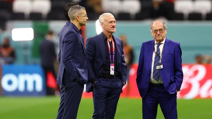 Soccer Football - FIFA World Cup Qatar 2022 - Semi Final - France v Morocco - Al Bayt Stadium, Al Khor, Qatar - December 14, 2022 France coach Didier Deschamps with President of the French Football Federation Noel Le Graet on the pitch before the match REUTERS/Kai Pfaffenbach