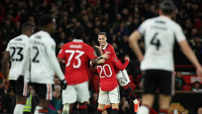 Soccer Football - Carabao Cup - Quarter Final - Manchester United v Charlton Athletic - Old Trafford, Manchester, Britain - January 10, 2023 Manchester Uniteds Antony celebrates scoring their first goal with Manchester Uniteds Diogo Dalot REUTERS/Phil Noble EDITORIAL USE ONLY. No use with unauthorized audio, video, data, fixture lists, club/league logos or live services. Online in-match use limited to 75 images, no video emulation. No use in betting, games or single club /league/player publications.  Please contact your account representative for further details.