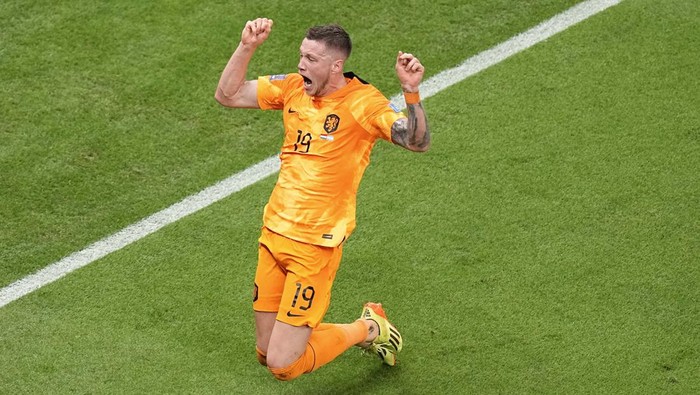 Wout Weghorst of the Netherlands celebrates after scoring during the World Cup quarterfinal soccer match between the Netherlands and Argentina, at the Lusail Stadium in Lusail, Qatar, Friday, Dec. 9, 2022. (AP Photo/Ariel Schalit)