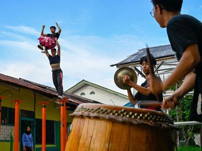 Mengintip Muda-mudi di Aceh Latihan Barongsai Jelang Imlek