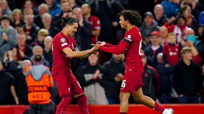 Liverpools Trent Alexander-Arnold (right) celebrates with team-mate Darwin Nunez after scoring their sides first goal of the game during the UEFA Champions League, Group A match at Anfield, Liverpool. Picture date: Tuesday October 4, 2022. (Photo by Martin Rickett/PA Images via Getty Images)
