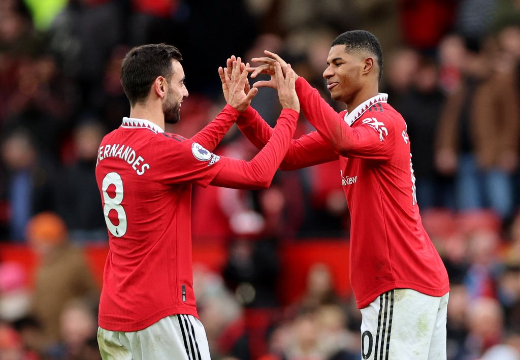 Soccer Football - Premier League - Manchester United v Manchester City - Old Trafford, Manchester, Britain - January 14, 2023 Manchester United's Bruno Fernandes and Marcus Rashford celebrate after the match REUTERS/Phil Noble EDITORIAL USE ONLY. No use with unauthorized audio, video, data, fixture lists, club/league logos or 'live' services. Online in-match use limited to 75 images, no video emulation. No use in betting, games or single club /league/player publications.  Please contact your account representative for further details.
