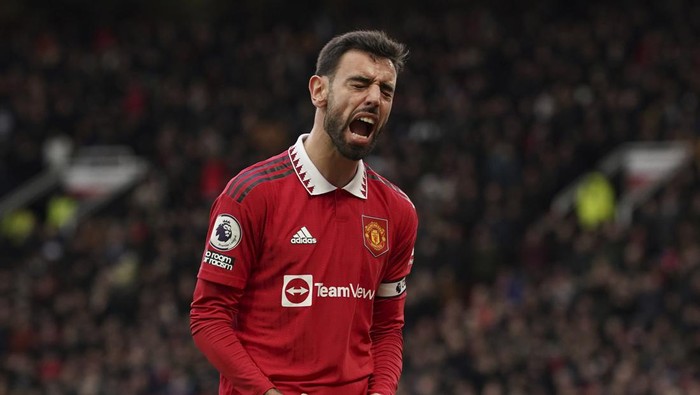 Manchester Uniteds Bruno Fernandes shouts after missing an opportunity to score during the English Premier League soccer match between Manchester United and Manchester City at Old Trafford in Manchester, England, Saturday, Jan. 14, 2023. (AP Photo/Dave Thompson)