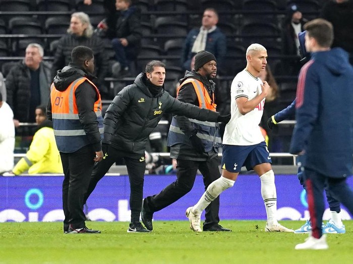 Tottenham Hotspur's Richarlison is separated from a clash with Arsenal goalkeeper Aaron Ramsdale (not pictured) during the Premier League match at the Tottenham Hotspur Stadium, London. Picture date: Sunday January 15, 2023. (Photo by Nick Potts/PA Images via Getty Images)