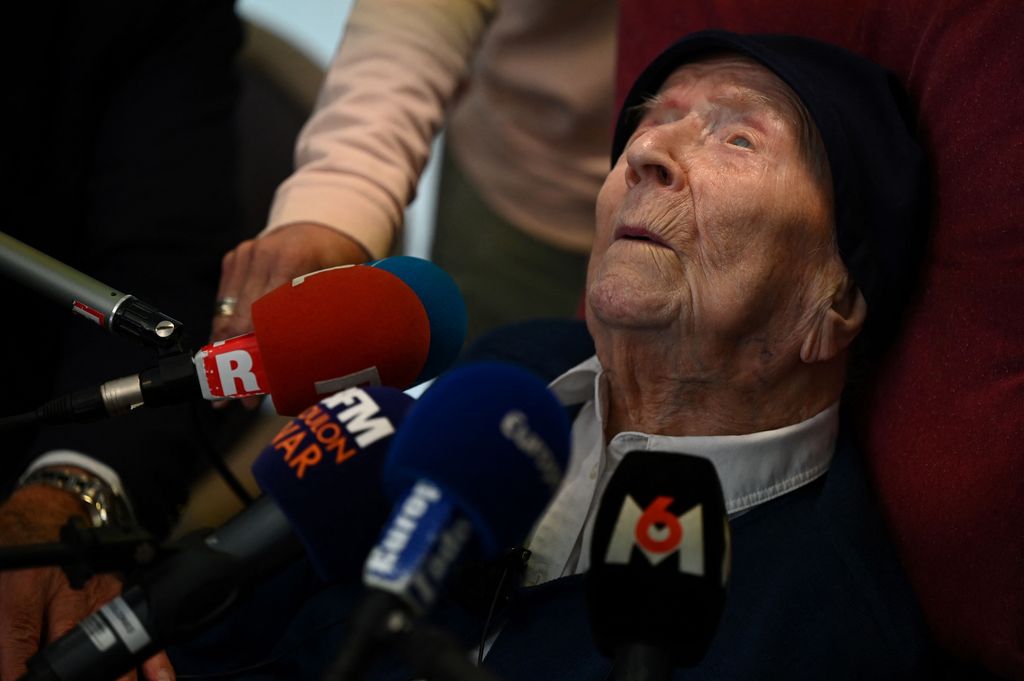 118 year-old French catholic nun Lucile Randon speaks to the press at the Saint-Catherine-Laboure nursing home where she lives in Toulon, southern France, on April 26, 2022, after becoming the world's oldest known person following the death announced the day before of a Japanese woman one year her senior. - Lucile Randon, known as Sister Andre, was born in southern France on February 11, 1904, when World War I was still a decade away. (Photo by Christophe SIMON / AFP) / The erroneous mention[s] appearing in the metadata of this photo by Christophe SIMON has been modified in AFP systems in the following manner: [Lucile Randon] instead of [Andre Randon]. Please immediately remove the erroneous mention[s] from all your online services and delete it (them) from your servers. If you have been authorized by AFP to distribute it (them) to third parties, please ensure that the same actions are carried out by them. Failure to promptly comply with these instructions will entail liability on your part for any continued or post notification usage. Therefore we thank you very much for all your attention and prompt action. We are sorry for the inconvenience this notification may cause and remain at your disposal for any further information you may require. (Photo by CHRISTOPHE SIMON/AFP via Getty Images)
