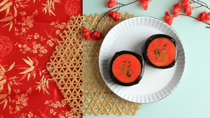 1364595381 Chinese New Year Cake with Chinese character FU means Fortune. Popular as Kue Keranjang or Dodol China or Nian Gao. Concept Chinese New Year Festival