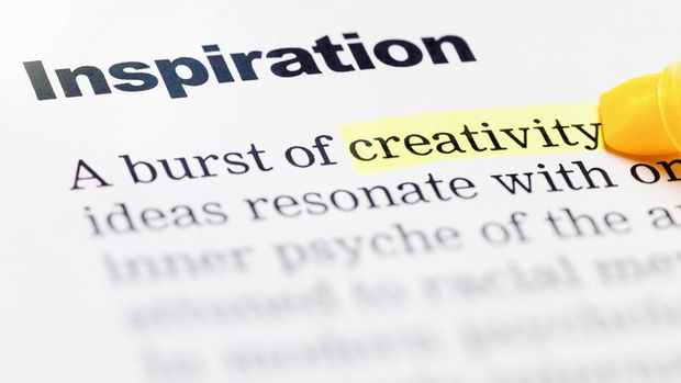 Detail of a textbook emphasizes the words Inspiration and Creativity.