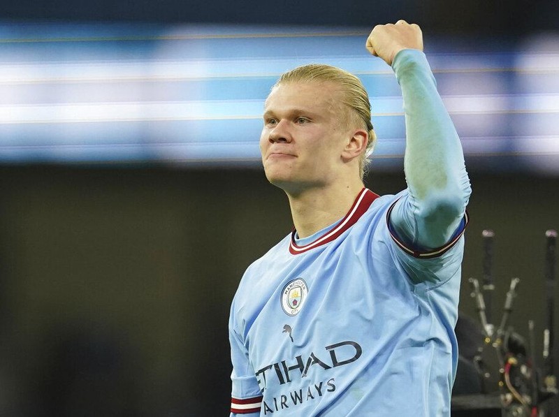 Manchester City's Erling Haaland celebrates at the end of the English Premier League soccer match between Manchester City and Tottenham Hotspur at the Etihad Stadium in Manchester, England, Thursday, Jan. 19, 2023. (AP Photo/Dave Thompson)