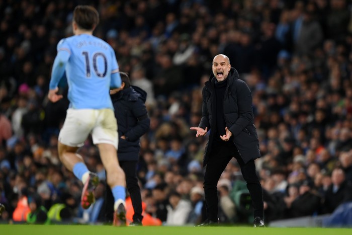 MANCHESTER, ENGLAND - JANUARY 19: Pep Guardiola, Manager of Manchester City, reacts during the Premier League match between Manchester City and Tottenham Hotspur at Etihad Stadium on January 19, 2023 in Manchester, England. (Photo by Shaun Botterill/Getty Images)