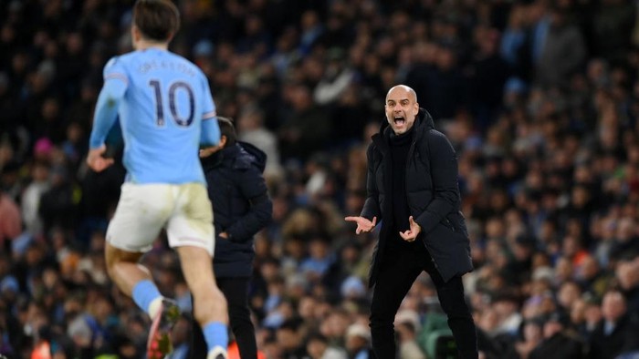 MANCHESTER, ENGLAND - JANUARY 19: Pep Guardiola, Manager of Manchester City, reacts during the Premier League match between Manchester City and Tottenham Hotspur at Etihad Stadium on January 19, 2023 in Manchester, England. (Photo by Shaun Botterill/Getty Images)