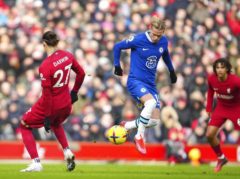 Chelsea's Mykhailo Mudryk controls the ball during the English Premier League soccer match between Liverpool and Chelsea at Anfield stadium in Liverpool, England, Saturday, Jan. 21, 2023. (AP Photo/Jon Super)