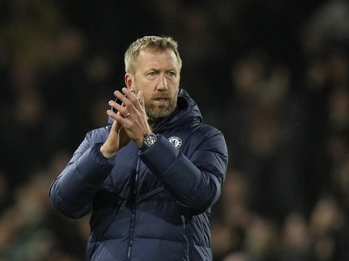 Chelsea's head coach Graham Potter applauds after the English Premier League soccer match between Fulham and Chelsea at the Craven Cottage stadium in London Thursday, Jan. 12, 2023. (AP Photo/Alastair Grant)