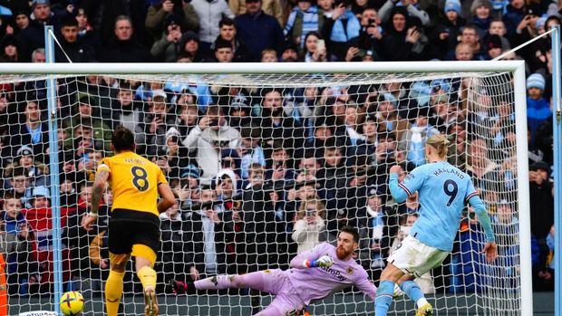 Manchester City's Erling Haaland scores their side's second goal of the game from the penalty spot during the Premier League match at the Etihad Stadium, Manchester. Picture date: Sunday January 22, 2023. (Photo by Martin Rickett/PA Images via Getty Images)