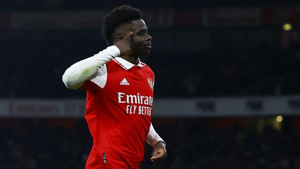 Soccer Football - Premier League - Arsenal v Manchester United - Emirates Stadium, London, Britain - January 22, 2023 Arsenal's Bukayo Saka celebrates scoring their second goal Action Images via Reuters/Peter Cziborra EDITORIAL USE ONLY. No use with unauthorized audio, video, data, fixture lists, club/league logos or 'live' services. Online in-match use limited to 75 images, no video emulation. No use in betting, games or single club /league/player publications.  Please contact your account representative for further details.
