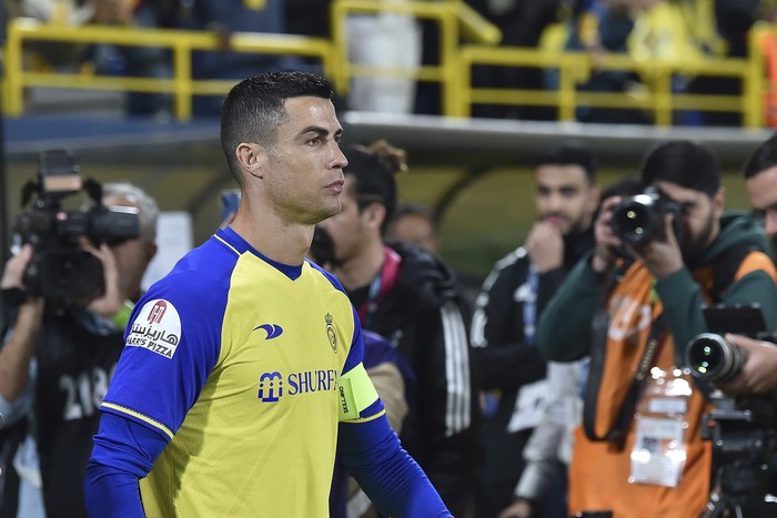 Al Nassrs Cristiano Ronaldo enters the pitch to play the Saudi Pro League match between Al Ettifaq FC and Al Nassr FC at Mrsool Park Stadium, in Riyadh, Saudi Arabia, Sunday, Jan. 22, 2023. (AP Photo)