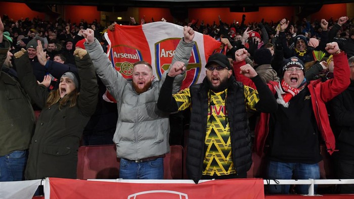 LONDON, ENGLAND - JANUARY 22: Arsenal fans celebrates the 3rd goal during the Premier League match between Arsenal FC and Manchester United at Emirates Stadium on January 22, 2023 in London, England. (Photo by Stuart MacFarlane/Arsenal FC via Getty Images)
