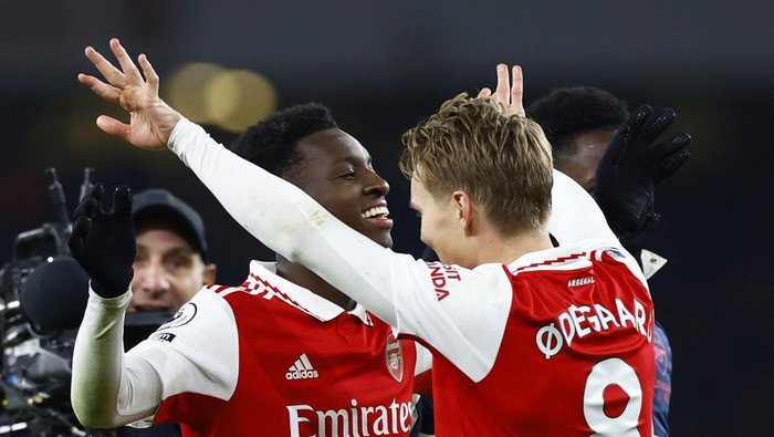 Soccer Football - Premier League - Arsenal v Manchester United - Emirates Stadium, London, Britain - January 22, 2023 Arsenals Eddie Nketiah and Martin Odegaard celebrate after the match Action Images via Reuters/Peter Cziborra EDITORIAL USE ONLY. No use with unauthorized audio, video, data, fixture lists, club/league logos or live services. Online in-match use limited to 75 images, no video emulation. No use in betting, games or single club /league/player publications.  Please contact your account representative for further details.