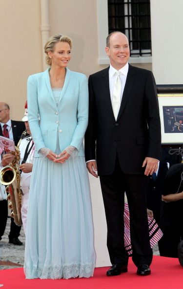 MONACO - JULY 01:  Princess Charlene of Monaco and Prince Albert II of Monaco look on after the civil ceremony of the Royal Wedding of Prince Albert II of Monaco to Charlene Wittstock at the Prince's Palace on July 1, 2011 in Monaco. The ceremony took place in the Throne Room of the Prince's Palace of Monaco, followed by a religious ceremony to be conducted in the main courtyard of the Palace on July 2. With her marriage to the head of state of Principality of Monaco, Charlene Wittstock has become Princess consort of Monaco and gain the title, Princess Charlene of Monaco. Celebrations including concerts and firework displays are being held across several days, attended by a guest list of global celebrities and heads of state.  (Photo by Toni Anne Barson/WireImage)