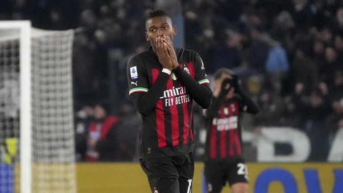 AC Milans Rafael Leao reacts after the fourth goal against his team during the Italian Serie A soccer match between Lazio and AC Milan at the Olympic Stadium in Rome, Tuesday, Jan. 24, 2023. (AP Photo/Gregorio Borgia)