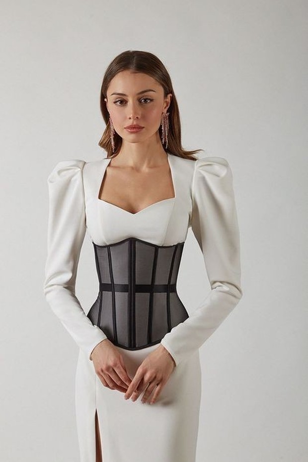 Kiat menyamarkan perut buncit/Foto: Pinterest.com/ Kiat menyamarkan perut buncit