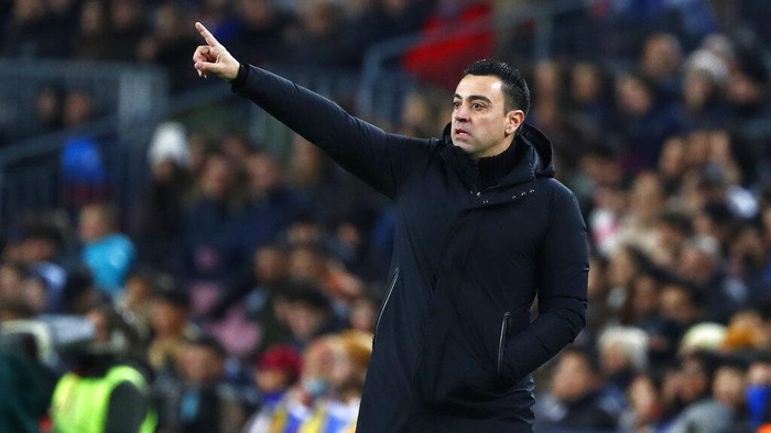 Barcelonas head coach Xavi Hernandez gives instructions during the Spanish Copa del Rey soccer match between Barcelona and Real Sociedad at the Camp Nou stadium, in Barcelona, Spain, Wednesday, Jan. 25, 2023. (AP Photo/Joan Monfort)